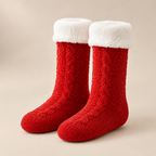 Paire de chaussettes pilou-pilou rouges montantes à revers blanc, sur fond clair